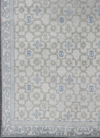 Modern Hand - Knotted Khotan Rug in Wool with All - Over Sub - Geometric Design by Keivan Woven Arts This modern Khotan rug has been hand - knotted in wool and features an all - over sub - geometric design rendered in blue, green and cream tones. A complem... - Keivan Woven ArtsOB - 103140415 - 1100057 - 9693Rug