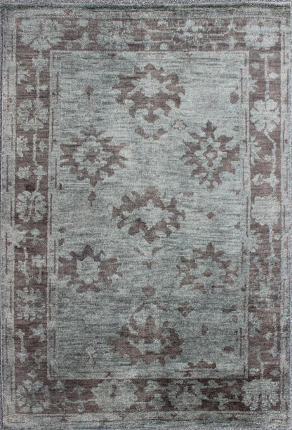 Indian Hand - Knotted Floral Oushak Rug in Muted Blue and Cocoa Measures 5'6 x 8'6 This floral Oushak rug was hand - knotted with Indian wool during the 2010's. The background of the center field is rendered in a beautiful muted blue, with f... - Keivan Woven ArtsOB - 103432967 - 0623026 - 6987Rug