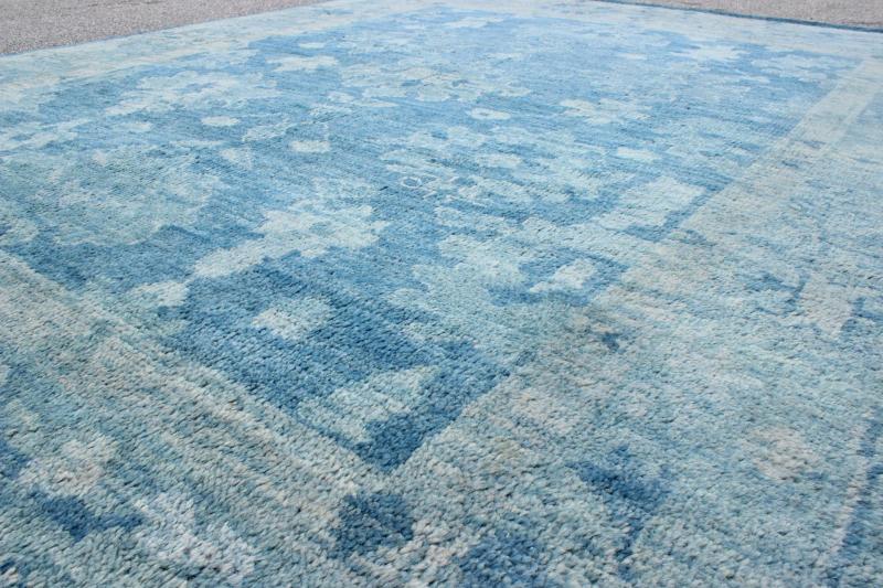 Hand - Knotted Modern Oushak Rug in Wool with Tribal Sub - Geometric Floral Design in Blue Tones This modern Indian Oushak rug has been hand - knotted in wool and features an all - over, sub - geometric floral design rendered in blue tones. A complementa... - Keivan Woven ArtsOB - 103433883 - 0623023 - 7537Rug