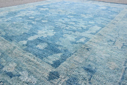 Hand - Knotted Modern Oushak Rug in Wool with Tribal Sub - Geometric Floral Design in Blue Tones This modern Indian Oushak rug has been hand - knotted in wool and features an all - over, sub - geometric floral design rendered in blue tones. A complementa... - Keivan Woven ArtsOB - 103433883 - 0623023 - 7537Rug