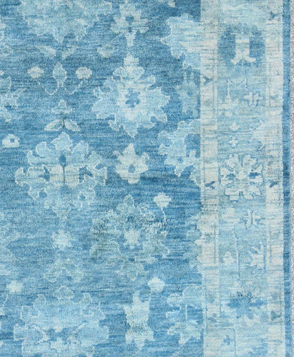 Hand - Knotted Modern Oushak Rug in Wool with Tribal Sub - Geometric Floral Design in Blue Tones This modern Indian Oushak rug has been hand - knotted in wool and features an all - over, sub - geometric floral design rendered in blue tones. A complementa... - Keivan Woven ArtsOB - 103433883 - 0623023 - 7537Rug