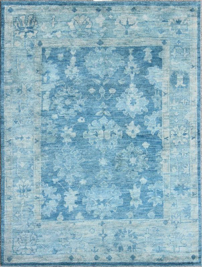 Hand - Knotted Modern Oushak Rug in Wool with Tribal Sub - Geometric Floral Design in Blue Tones This modern Indian Oushak rug has been hand - knotted in wool and features an all - over, sub - geometric floral design rendered in blue tones. A complementa... - Keivan Woven ArtsOB - 103433883 - 0623023 - 7537Rug