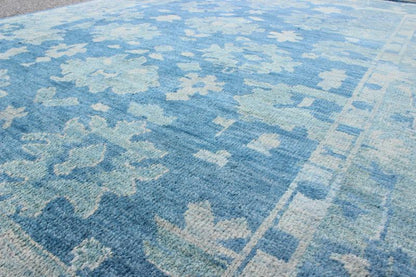Hand - Knotted Modern Oushak Rug in Wool with Sub - Geometric Floral Design in Blue Tones This modern Indian Oushak rug has been hand - knotted in wool and features an all - over, sub - geometric floral design rendered in blue tones. A complementary, mult... - Keivan Woven ArtsOB - 103433912 - 0623023 - 7549Rug