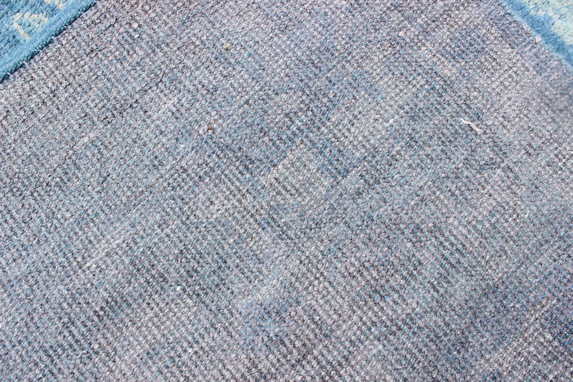 Hand - Knotted Modern Oushak Rug in Wool with Sub - Geometric Floral Design in Blue Tones This modern Indian Oushak rug has been hand - knotted in wool and features an all - over, sub - geometric floral design rendered in blue tones. A complementary, mult... - Keivan Woven ArtsOB - 103433912 - 0623023 - 7549Rug