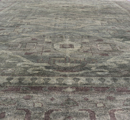 Large Modern Tribal Medallion Khotan in Muted Earthy Green Colors Measures 12'0 x 15'0 The border has tribal markings in a rich green brown color, atop a rustic blend of forest green background. The field remains the same forest green c... - Keivan Woven ArtsOB - 103434781 - 6230017 - 21084Rug