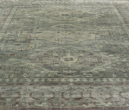 Large Modern Tribal Medallion Khotan in Muted Earthy Green Colors Measures 12'0 x 15'0 The border has tribal markings in a rich green brown color, atop a rustic blend of forest green background. The field remains the same forest green c... - Keivan Woven ArtsOB - 103434781 - 6230017 - 21084Rug