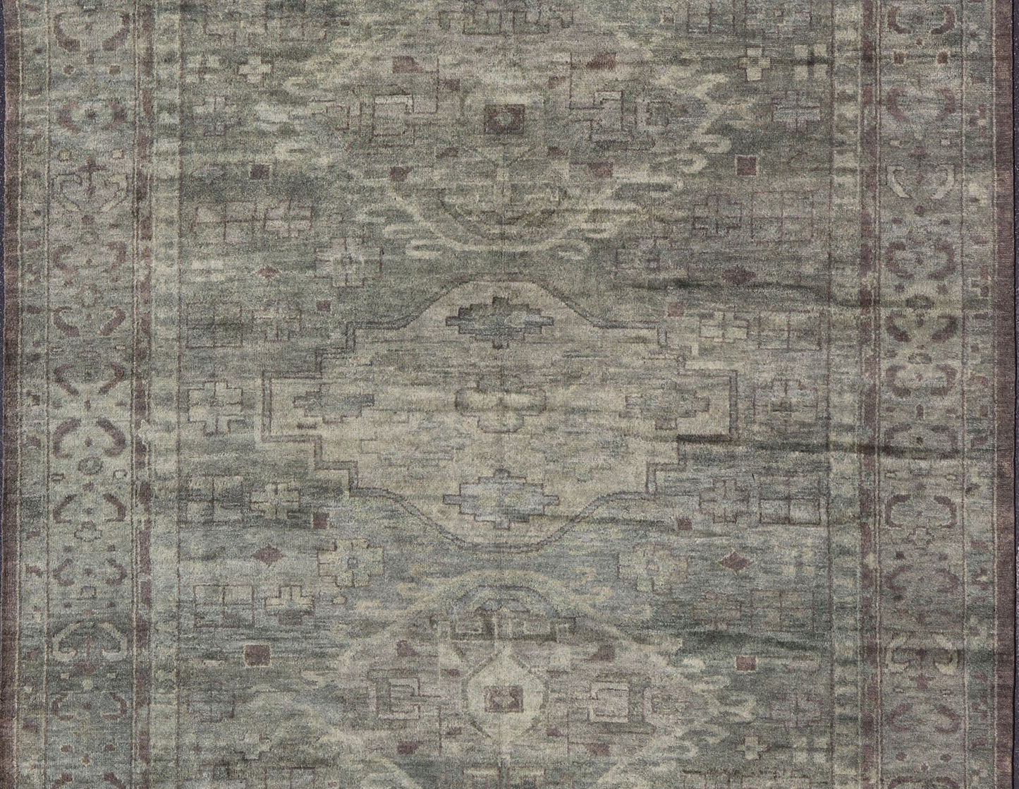Large Modern Tribal Medallion Khotan in Muted Earthy Green Colors Measures 12'0 x 15'0 The border has tribal markings in a rich green brown color, atop a rustic blend of forest green background. The field remains the same forest green c... - Keivan Woven ArtsOB - 103434781 - 6230017 - 21084Rug