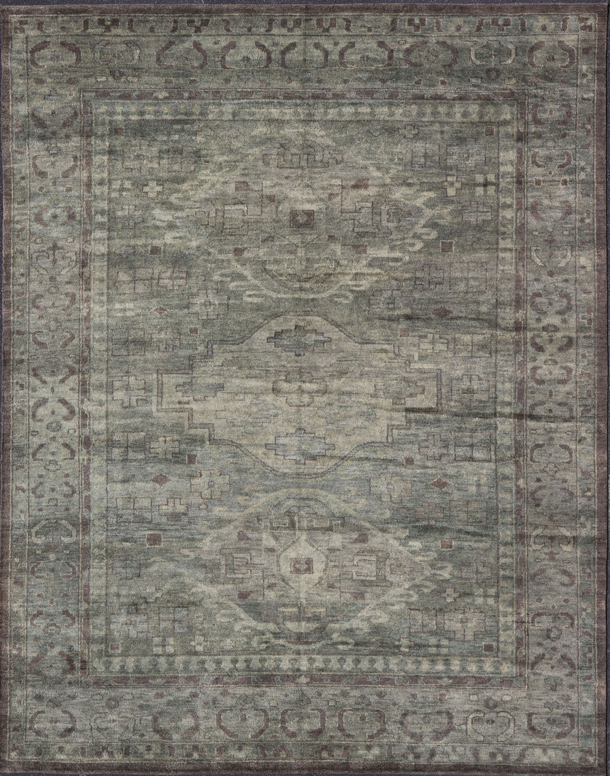 Large Modern Tribal Medallion Khotan in Muted Earthy Green Colors Measures 12'0 x 15'0 The border has tribal markings in a rich green brown color, atop a rustic blend of forest green background. The field remains the same forest green c... - Keivan Woven ArtsOB - 103434781 - 6230017 - 21084Rug