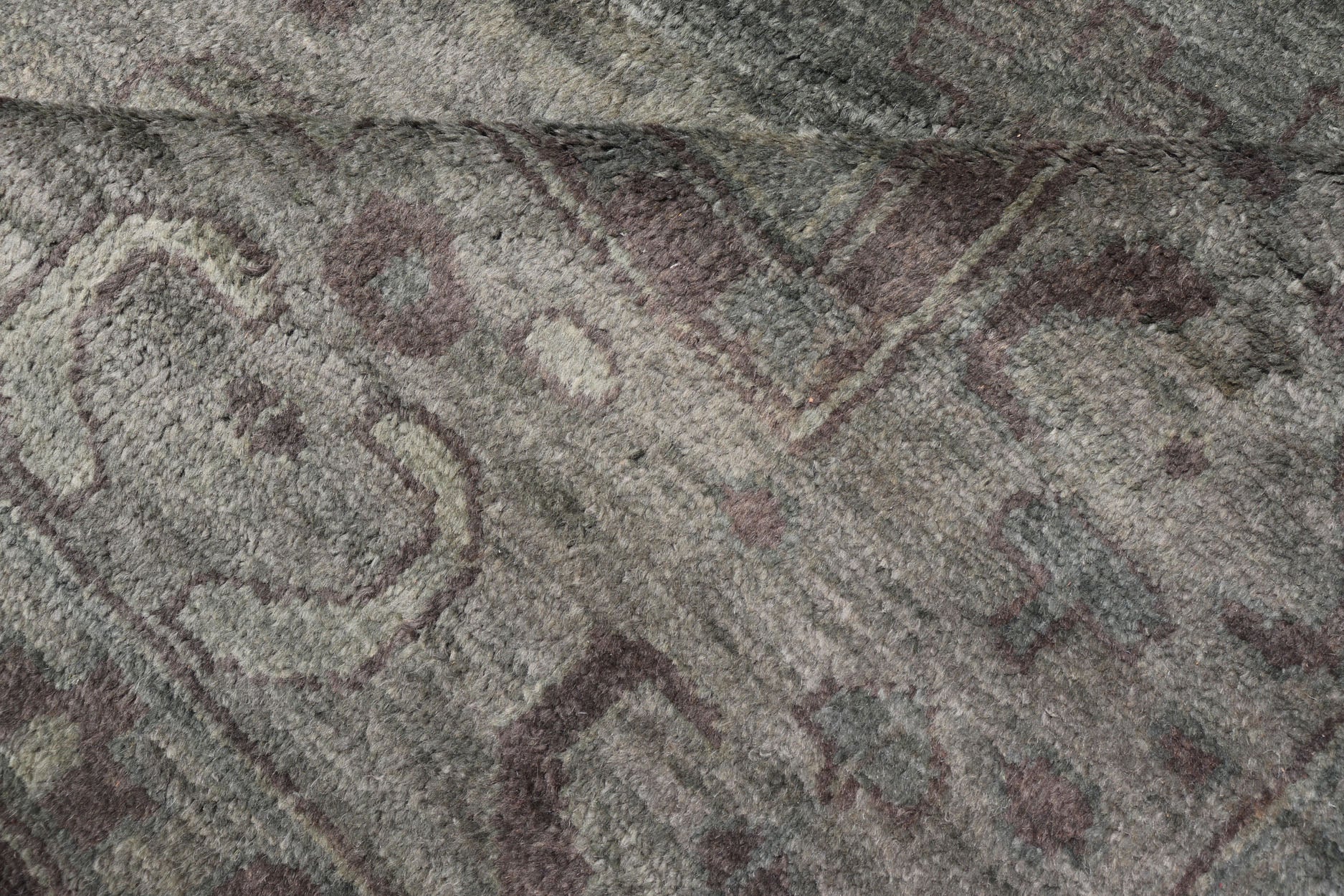 Large Modern Tribal Medallion Khotan in Muted Earthy Green Colors Measures 12'0 x 15'0 The border has tribal markings in a rich green brown color, atop a rustic blend of forest green background. The field remains the same forest green c... - Keivan Woven ArtsOB - 103434781 - 6230017 - 21084Rug