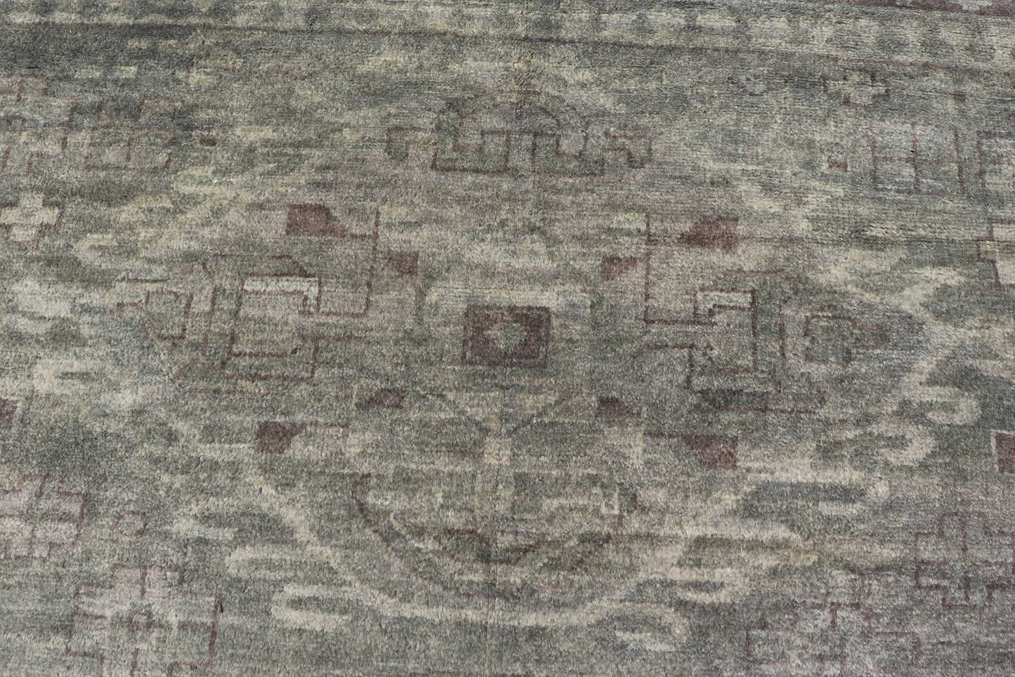 Large Modern Tribal Medallion Khotan in Muted Earthy Green Colors Measures 12'0 x 15'0 The border has tribal markings in a rich green brown color, atop a rustic blend of forest green background. The field remains the same forest green c... - Keivan Woven ArtsOB - 103434781 - 6230017 - 21084Rug