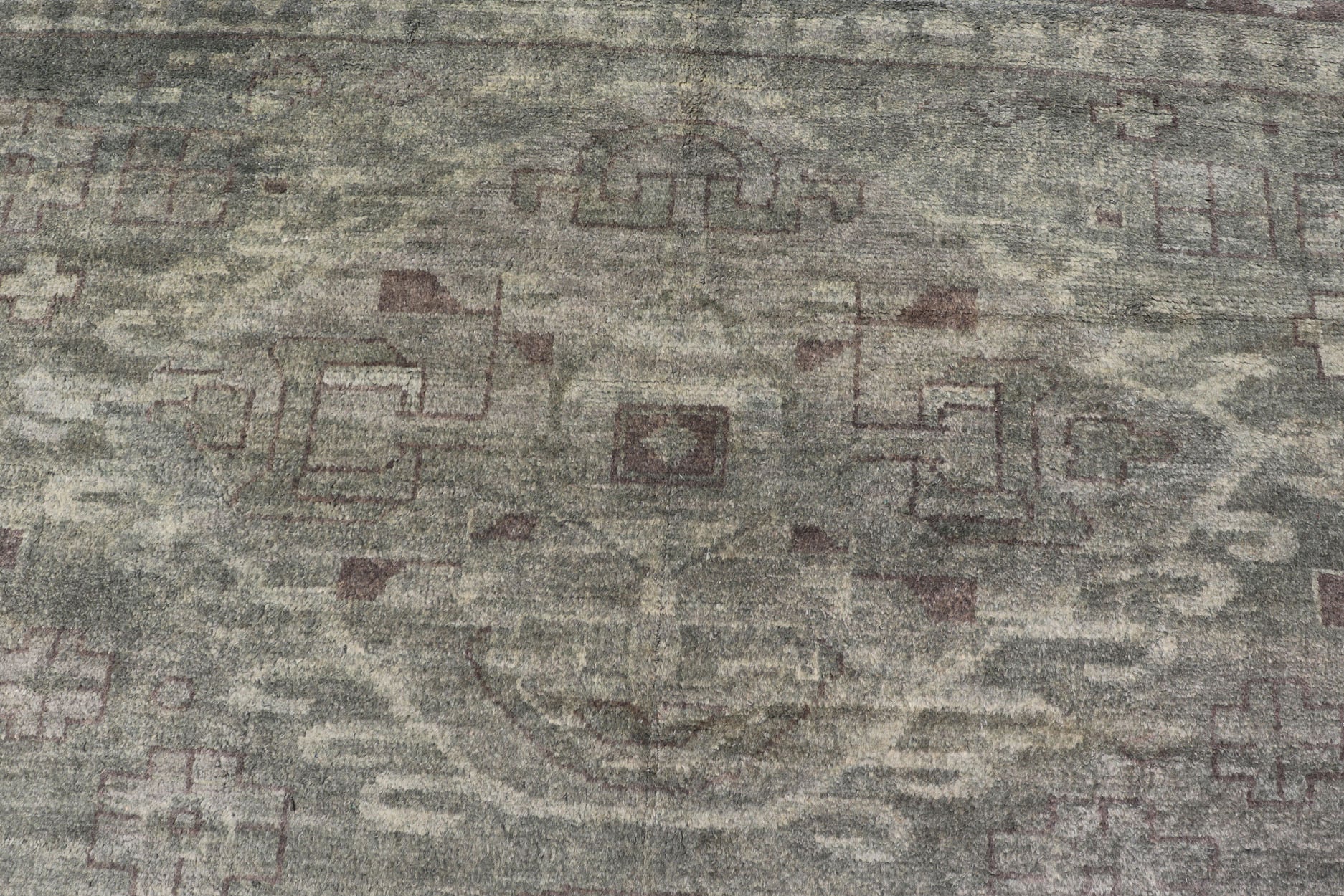 Large Modern Tribal Medallion Khotan in Muted Earthy Green Colors Measures 12'0 x 15'0 The border has tribal markings in a rich green brown color, atop a rustic blend of forest green background. The field remains the same forest green c... - Keivan Woven ArtsOB - 103434781 - 6230017 - 21084Rug