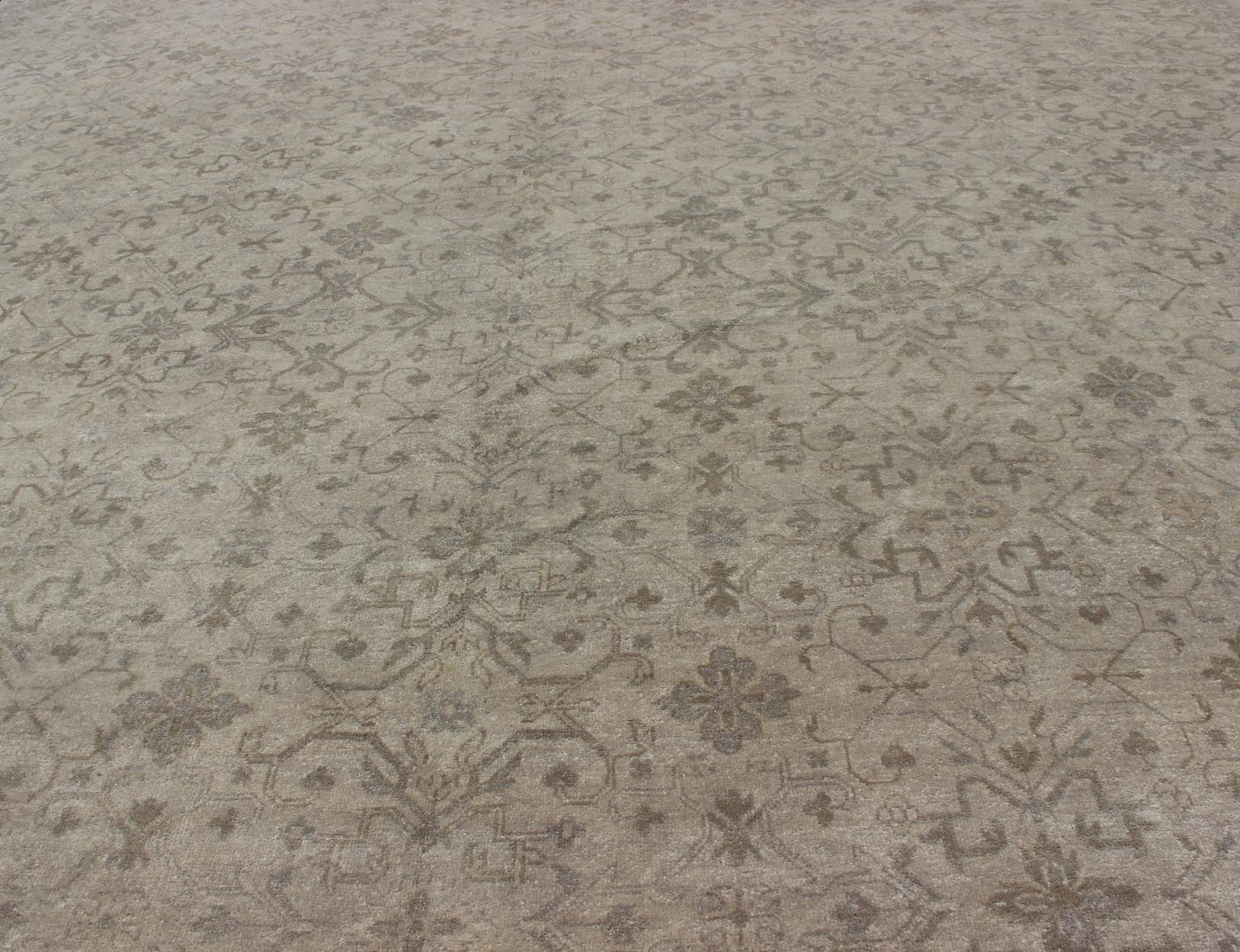 Modern Hand - Knotted Khotan Rug with Geometric Pattern in Taupe and Gray Tones Measures: 12'0 x 16'0. This modern hand - knotted Khotan features a geometric, all - over design flanked by a repeating pattern in the border. The entirety of th... - Keivan Woven ArtsOB - 103754979 - 680002 - 9699Rug