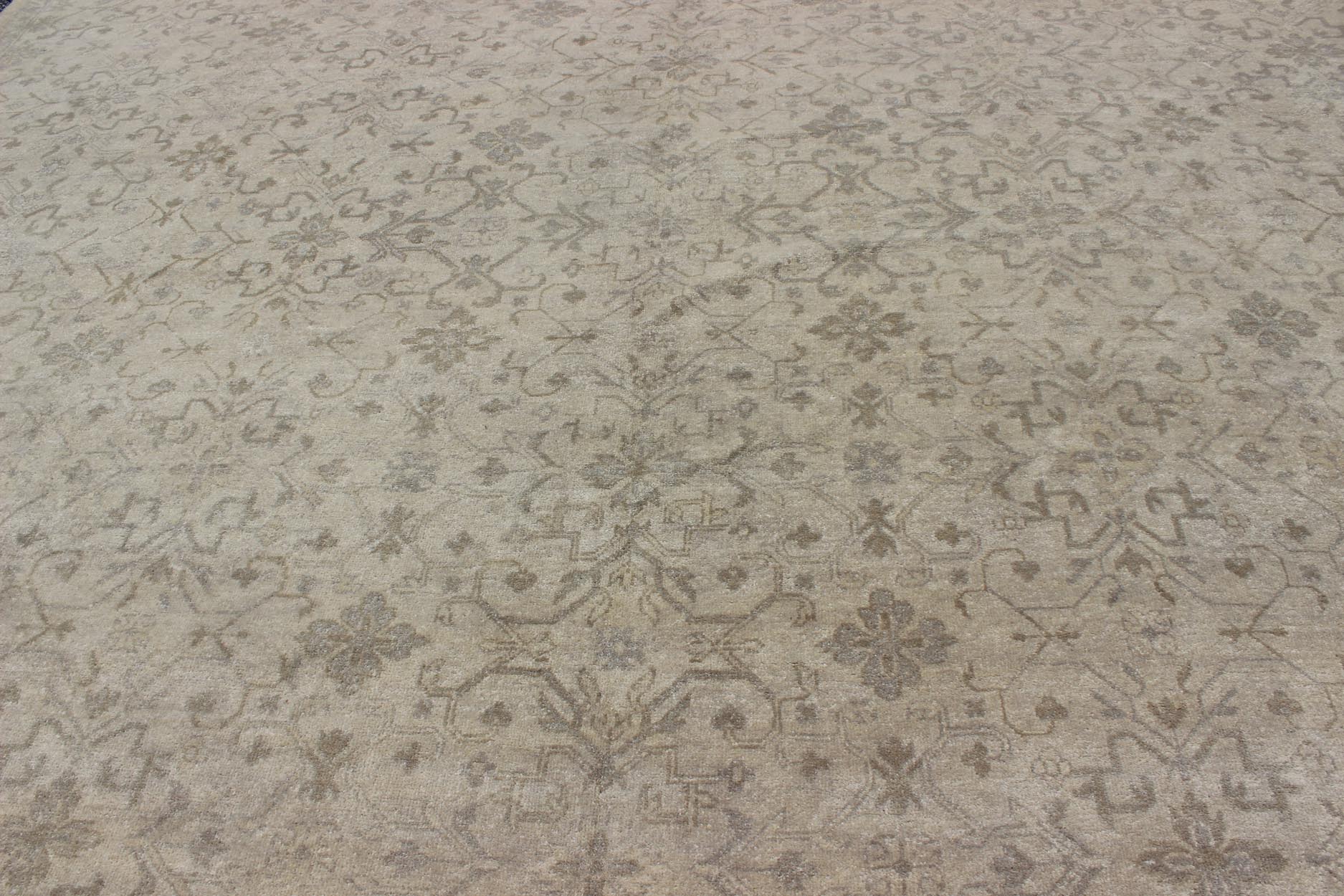 Modern Hand - Knotted Khotan Rug with Geometric Pattern in Taupe and Gray Tones Measures: 12'0 x 16'0. This modern hand - knotted Khotan features a geometric, all - over design flanked by a repeating pattern in the border. The entirety of th... - Keivan Woven ArtsOB - 103754979 - 680002 - 9699Rug