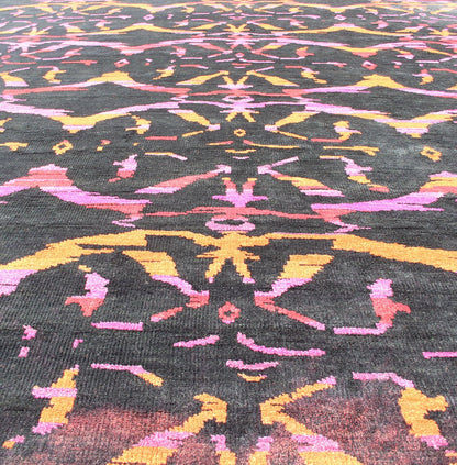 This modern Indian rug has been hand - knotted in wool and features an all - over, sub - geometric design rendered in purple, yellow, red, pink and charcoal brown tones; making it a good fit for a wide variety of interiors. Measures: 8'8 x 12. Modern ... - Keivan Woven ArtsOB - 103922918 - 6590003 - 13588