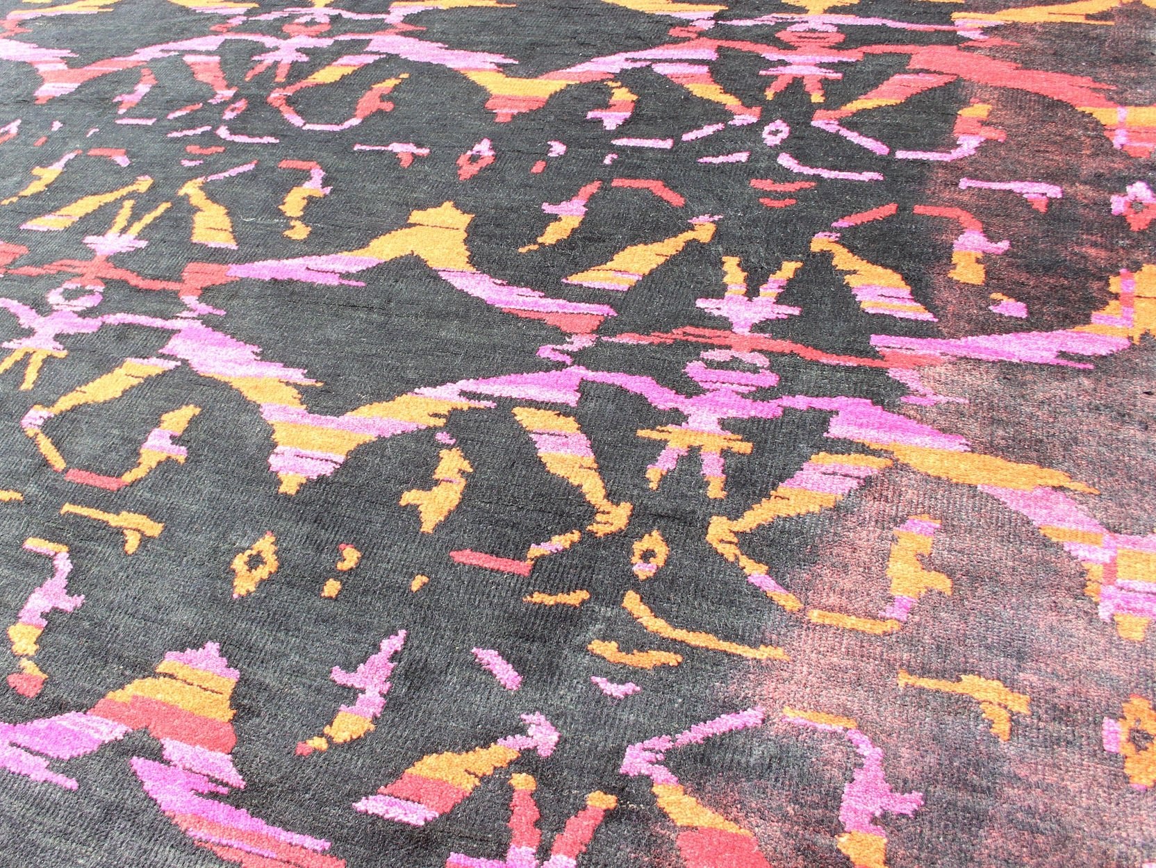 This modern Indian rug has been hand - knotted in wool and features an all - over, sub - geometric design rendered in purple, yellow, red, pink and charcoal brown tones; making it a good fit for a wide variety of interiors. Measures: 8'8 x 12. Modern ... - Keivan Woven ArtsOB - 103922918 - 6590003 - 13588