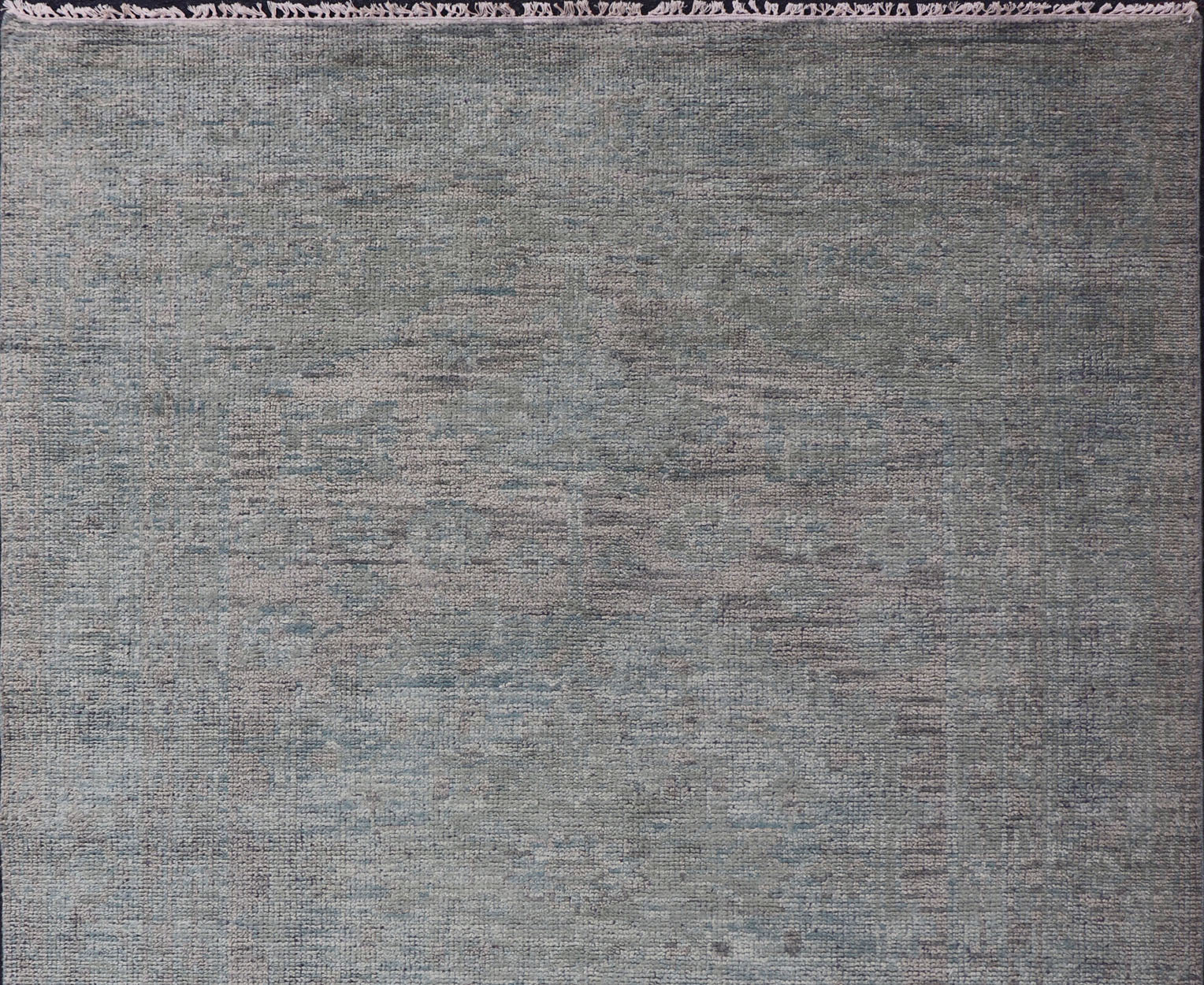 Modern Muted Oushak Type Rug in Wool With Sub - Geometric Design in Green & Earthy Tones This modern Indian rug has been hand - knotted in wool and features an all - over, sub - geometric design rendered in green and earthy tones. A complementary, mult... - Keivan Woven ArtsOB - 104744922 - 56230141 - 15512
