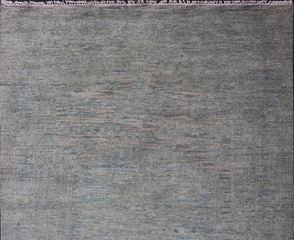 Modern Muted Oushak Type Rug in Wool With Sub - Geometric Design in Green & Earthy Tones This modern Indian rug has been hand - knotted in wool and features an all - over, sub - geometric design rendered in green and earthy tones. A complementary, mult... - Keivan Woven ArtsOB - 104744922 - 56230141 - 15512