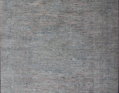 Modern Muted Oushak Type Rug in Wool With Sub - Geometric Design in Green & Earthy Tones This modern Indian rug has been hand - knotted in wool and features an all - over, sub - geometric design rendered in green and earthy tones. A complementary, mult... - Keivan Woven ArtsOB - 104744922 - 56230141 - 15512