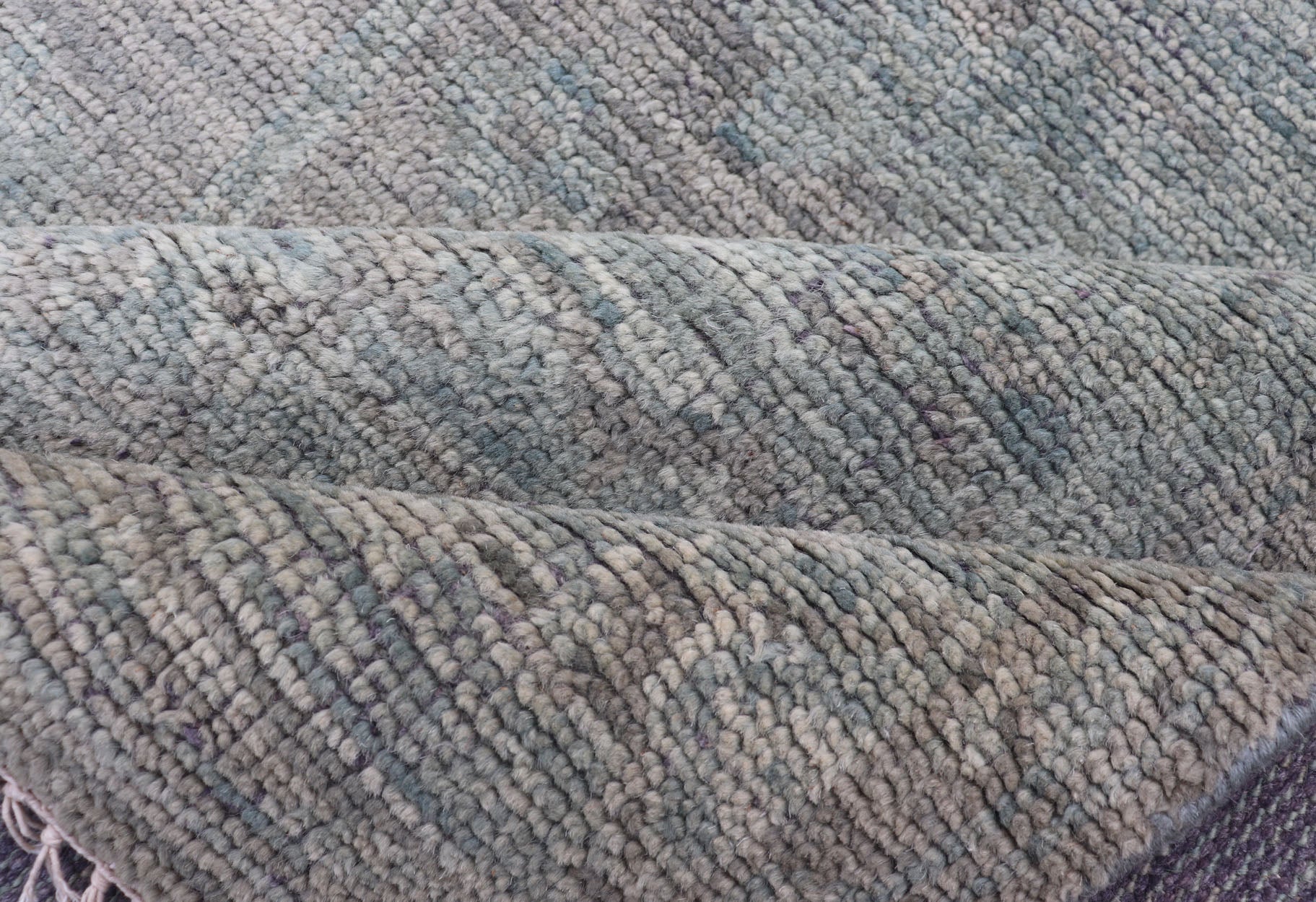 Modern Muted Oushak Type Rug in Wool With Sub - Geometric Design in Green & Earthy Tones This modern Indian rug has been hand - knotted in wool and features an all - over, sub - geometric design rendered in green and earthy tones. A complementary, mult... - Keivan Woven ArtsOB - 104744922 - 56230141 - 15512Rug
