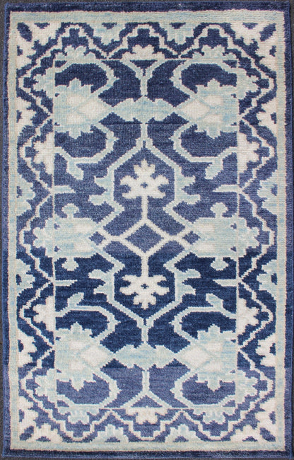 Modern Hand - Knotted Oushak Rug in Wool with Sub - Geometric Design in Blue This modern Indian Oushak rug has been hand - knotted in wool and features an all - over, sub - geometric design rendered in blue and ivory tones. A complementary, multi - tiered ... - Keivan Woven ArtsOB - 10542973 - 6230320 - 11311Rug