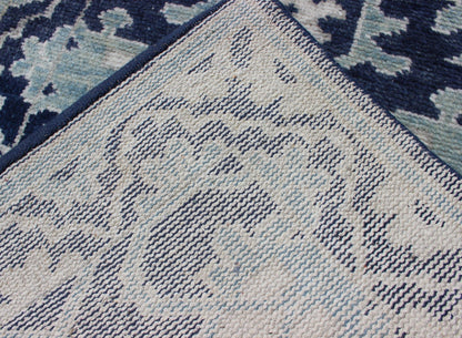 Modern Hand - Knotted Oushak Rug in Wool with Sub - Geometric Design in Blue This modern Indian Oushak rug has been hand - knotted in wool and features an all - over, sub - geometric design rendered in blue and ivory tones. A complementary, multi - tiered ... - Keivan Woven ArtsOB - 10542973 - 6230320 - 11311Rug