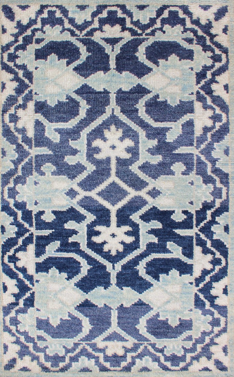 Modern Hand - Knotted Oushak Rug in Wool with Sub - Geometric Design in Blue This modern Indian Oushak rug has been hand - knotted in wool and features an all - over, sub - geometric design rendered in blue and ivory tones. A complementary, multi - tiered ... - Keivan Woven ArtsOB - 10542973 - 6230320 - 11311Rug