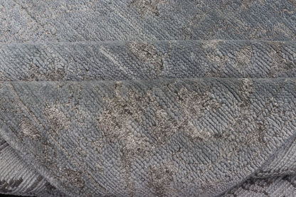 Modern Hand - Knotted Rug in Wool with Floral Design in Blue and Gray This modern Indian rug has been hand - knotted in wool and features an all - over, sub - geometric floral design rendered in blue and gray tones. A complementary, multi - tiered border ... - Keivan Woven ArtsOB - 105860644 - 17346