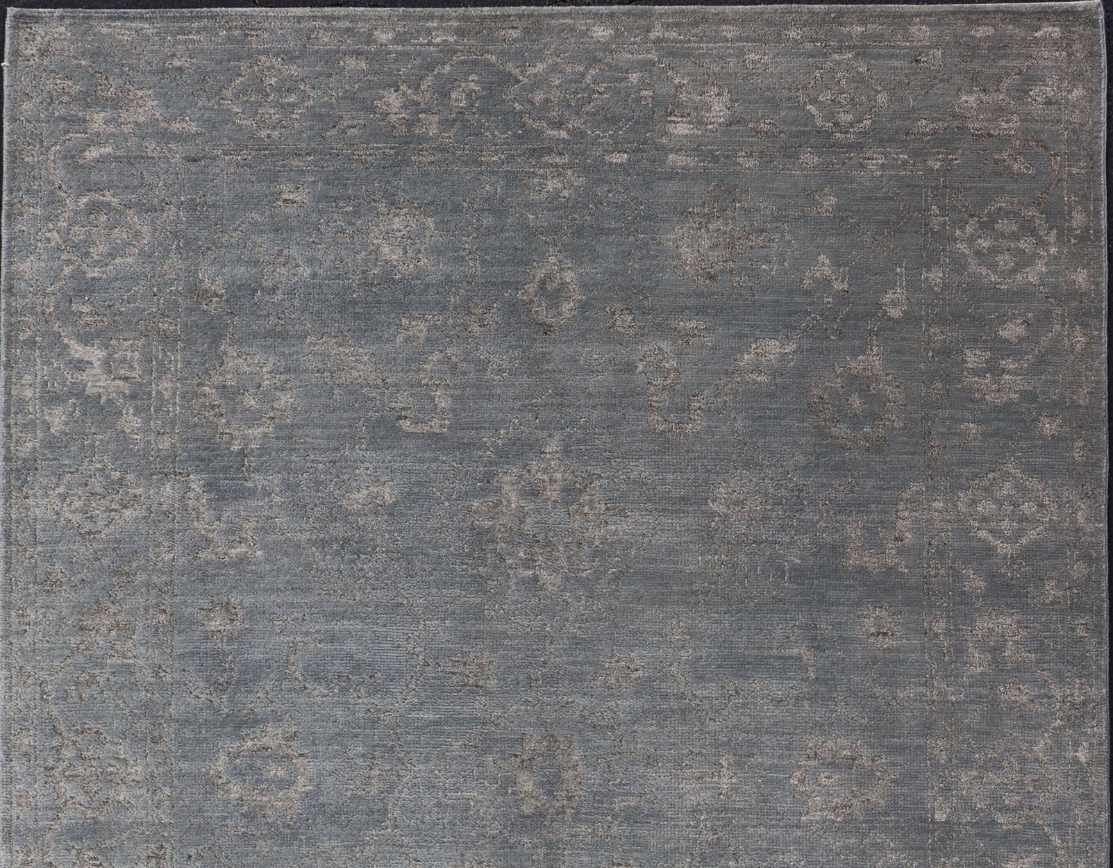 Modern Hand - Knotted Rug in Wool with Floral Design in Blue and Gray This modern Indian rug has been hand - knotted in wool and features an all - over, sub - geometric floral design rendered in blue and gray tones. A complementary, multi - tiered border ... - Keivan Woven ArtsOB - 105860644 - 17346