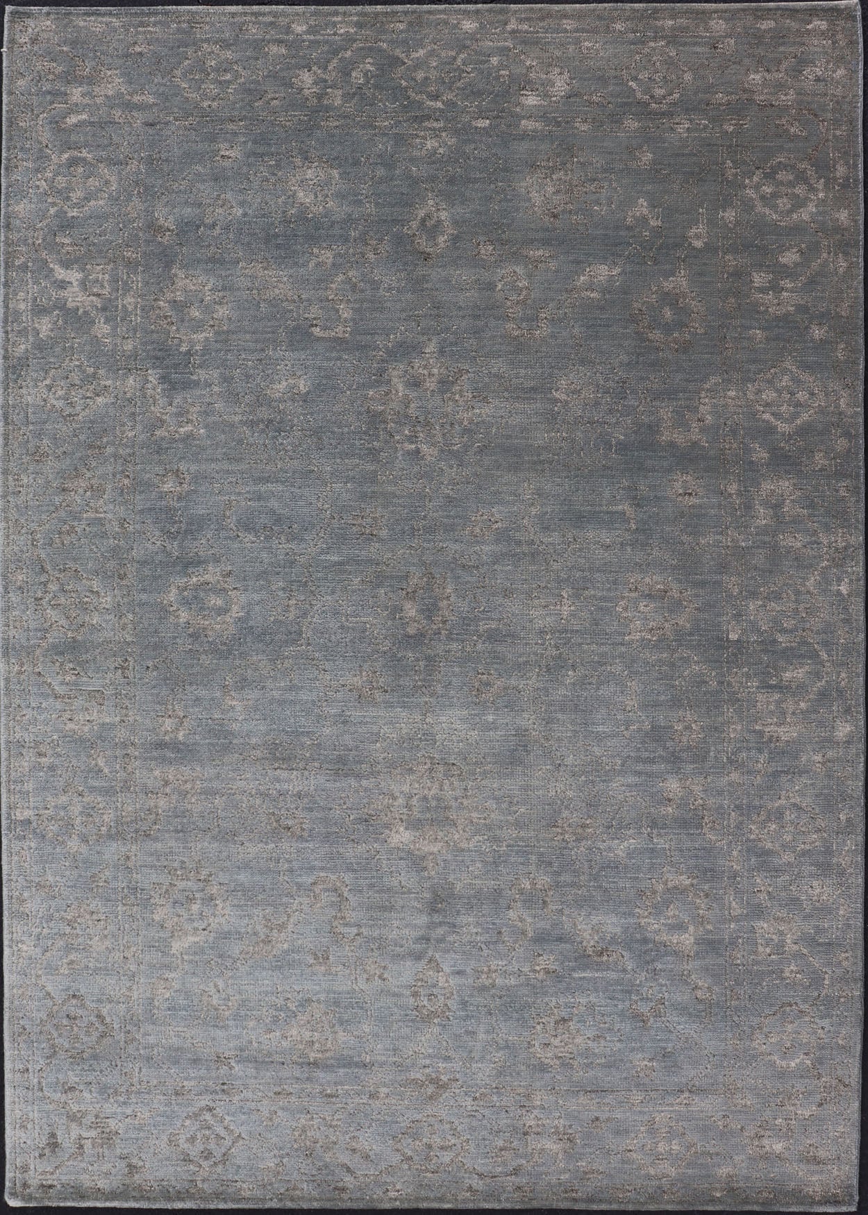 Modern Hand - Knotted Rug in Wool with Floral Design in Blue and Gray This modern Indian rug has been hand - knotted in wool and features an all - over, sub - geometric floral design rendered in blue and gray tones. A complementary, multi - tiered border ... - Keivan Woven ArtsOB - 105860644 - 17346