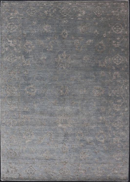 Modern Hand - Knotted Rug in Wool with Floral Design in Blue and Gray This modern Indian rug has been hand - knotted in wool and features an all - over, sub - geometric floral design rendered in blue and gray tones. A complementary, multi - tiered border ... - Keivan Woven ArtsOB - 105860644 - 17346