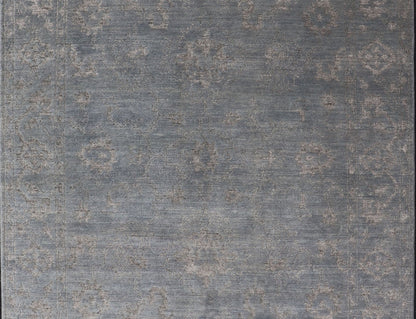 Modern Hand - Knotted Rug in Wool with Floral Design in Blue and Gray This modern Indian rug has been hand - knotted in wool and features an all - over, sub - geometric floral design rendered in blue and gray tones. A complementary, multi - tiered border ... - Keivan Woven ArtsOB - 105860644 - 17346Rug