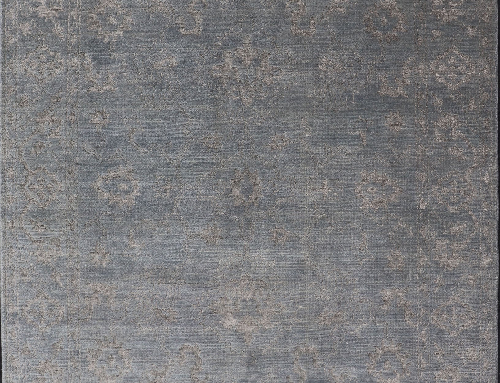 Modern Hand - Knotted Rug in Wool with Floral Design in Blue and Gray This modern Indian rug has been hand - knotted in wool and features an all - over, sub - geometric floral design rendered in blue and gray tones. A complementary, multi - tiered border ... - Keivan Woven ArtsOB - 105860644 - 17346