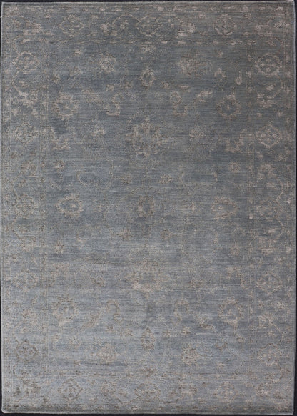 Modern Hand - Knotted Rug in Wool with Floral Design in Blue and Gray This modern Indian rug has been hand - knotted in wool and features an all - over, sub - geometric floral design rendered in blue and gray tones. A complementary, multi - tiered border ... - Keivan Woven ArtsOB - 105860644 - 17346Rug
