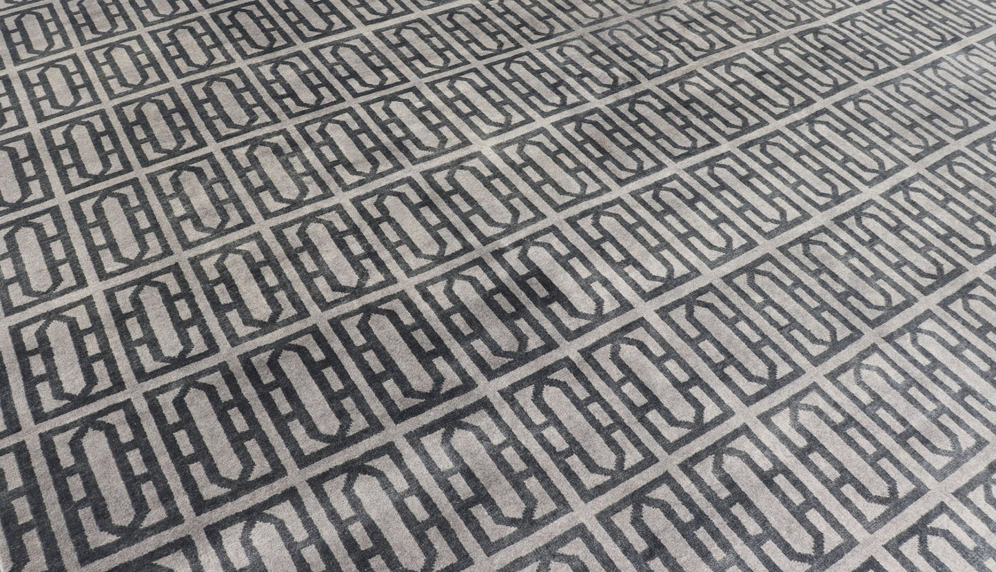 Modern Hand - Knotted Rug in Wool with All - Over Geometric Design in Gray and Black This modern India rug has been hand - knotted in wool and features an all - over geometric design rendered in gray and black tones. A complementary, multi - tiered borde... - Keivan Woven ArtsOB - 106011594 - 12560129 - 15518Rug