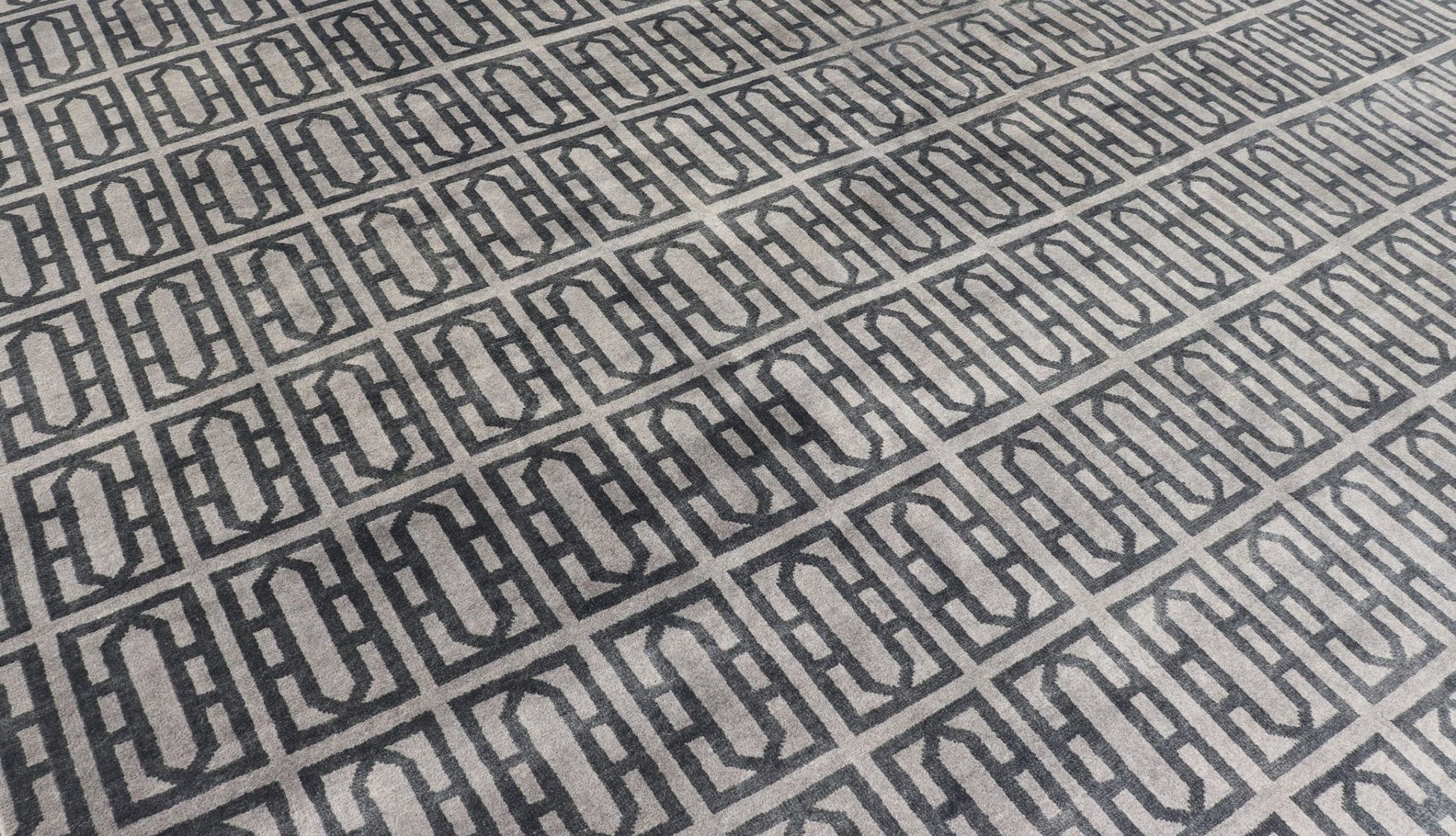 Modern Hand - Knotted Rug in Wool with All - Over Geometric Design in Gray and Black This modern India rug has been hand - knotted in wool and features an all - over geometric design rendered in gray and black tones. A complementary, multi - tiered borde... - Keivan Woven ArtsOB - 106011594 - 12560129 - 15518Rug