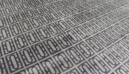 Modern Hand - Knotted Rug in Wool with All - Over Geometric Design in Gray and Black This modern India rug has been hand - knotted in wool and features an all - over geometric design rendered in gray and black tones. A complementary, multi - tiered borde... - Keivan Woven ArtsOB - 106011594 - 12560129 - 15518Rug