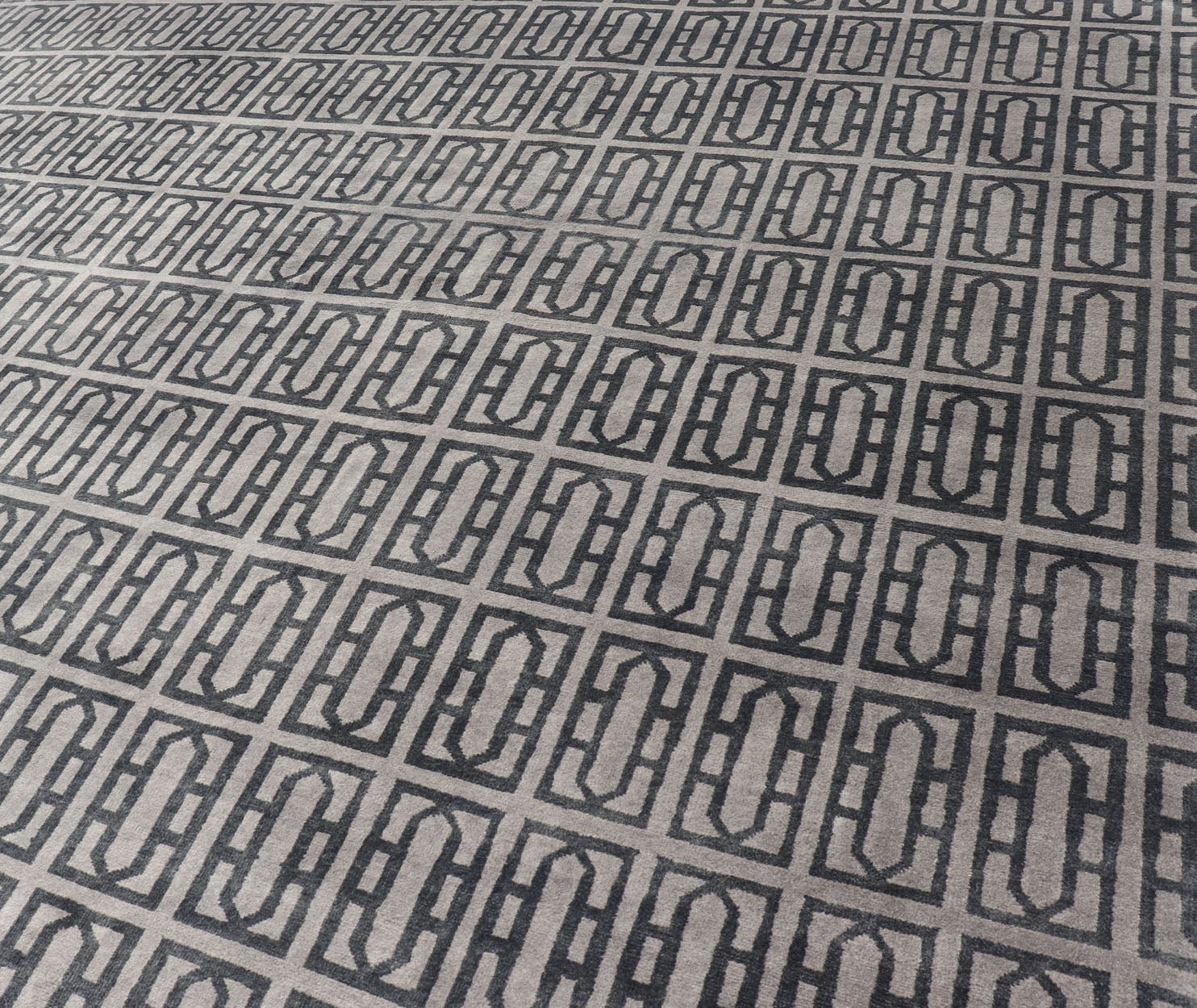 Modern Hand - Knotted Rug in Wool with All - Over Geometric Design in Gray and Black This modern India rug has been hand - knotted in wool and features an all - over geometric design rendered in gray and black tones. A complementary, multi - tiered borde... - Keivan Woven ArtsOB - 106011594 - 12560129 - 15518Rug