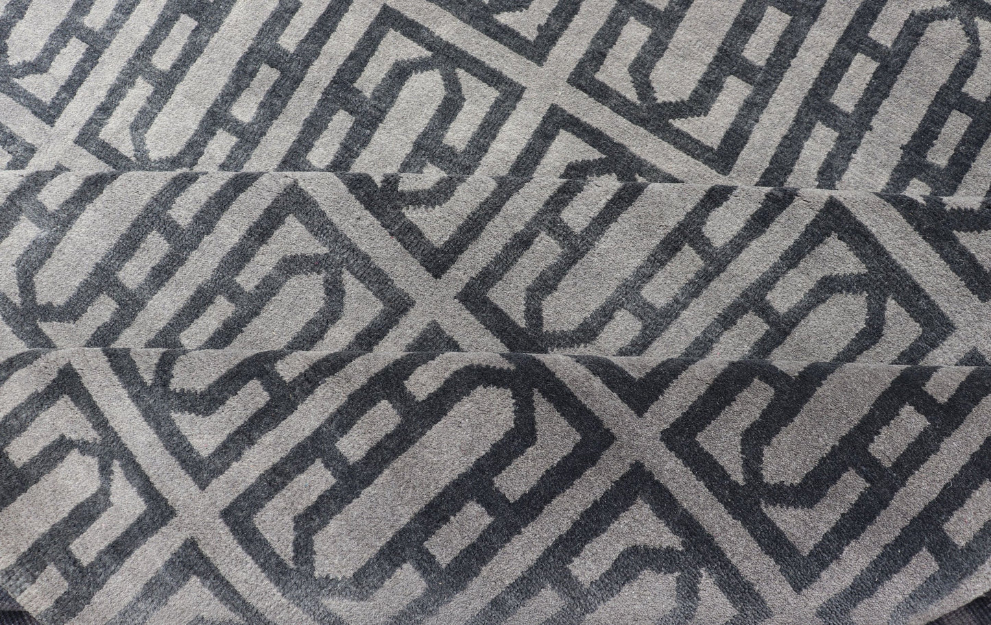 Modern Hand - Knotted Rug in Wool with All - Over Geometric Design in Gray and Black This modern India rug has been hand - knotted in wool and features an all - over geometric design rendered in gray and black tones. A complementary, multi - tiered borde... - Keivan Woven ArtsOB - 106011594 - 12560129 - 15518Rug