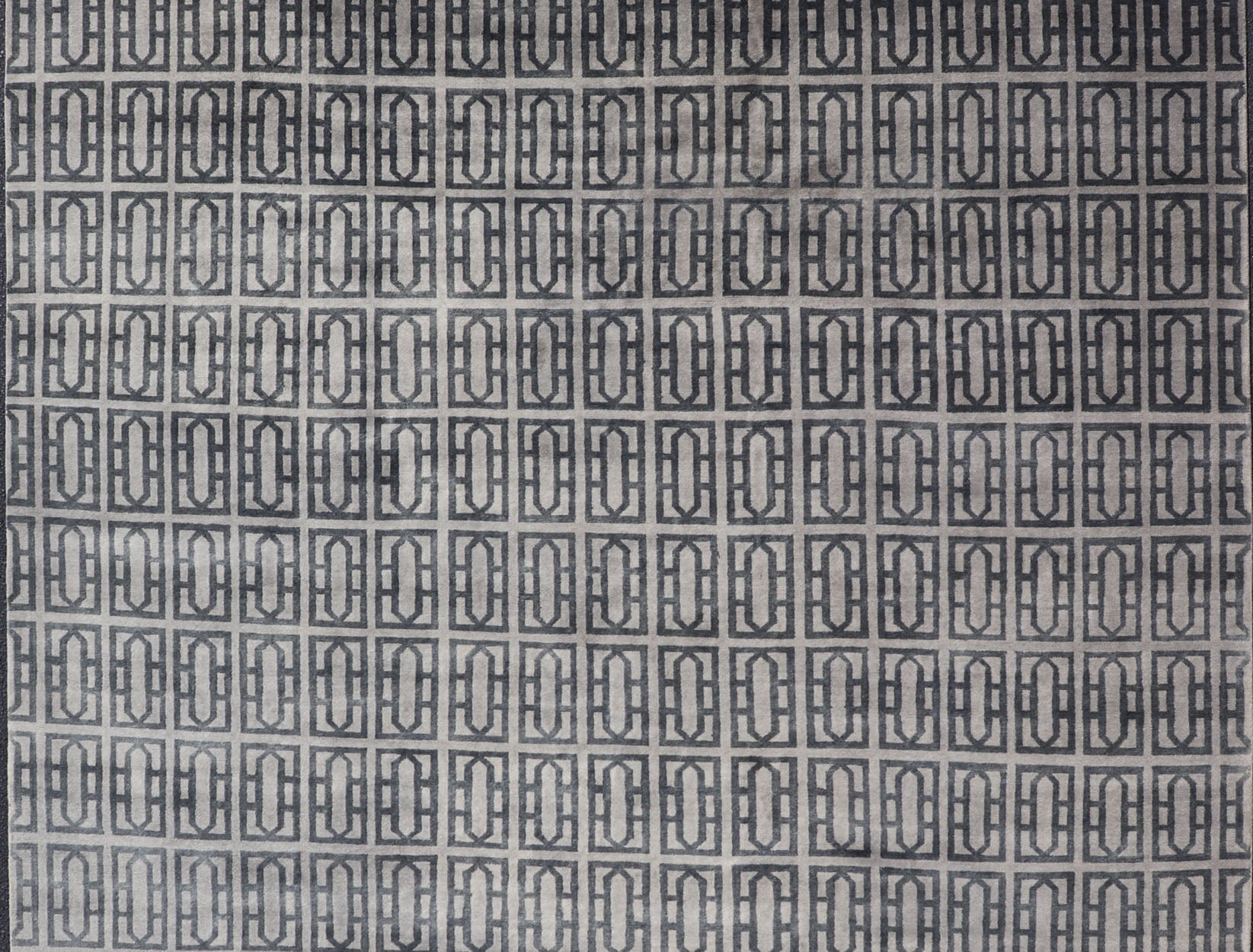 Modern Hand - Knotted Rug in Wool with All - Over Geometric Design in Gray and Black This modern India rug has been hand - knotted in wool and features an all - over geometric design rendered in gray and black tones. A complementary, multi - tiered borde... - Keivan Woven ArtsOB - 106011594 - 12560129 - 15518Rug