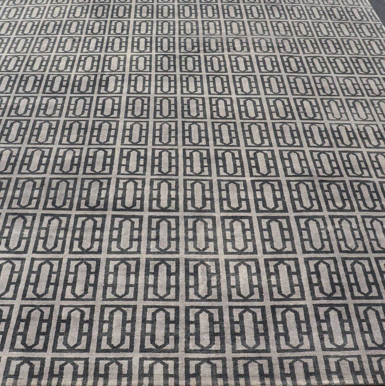 Modern Hand - Knotted Rug in Wool with All - Over Geometric Design in Gray and Black This modern India rug has been hand - knotted in wool and features an all - over geometric design rendered in gray and black tones. A complementary, multi - tiered borde... - Keivan Woven ArtsOB - 106011594 - 12560129 - 15518Rug