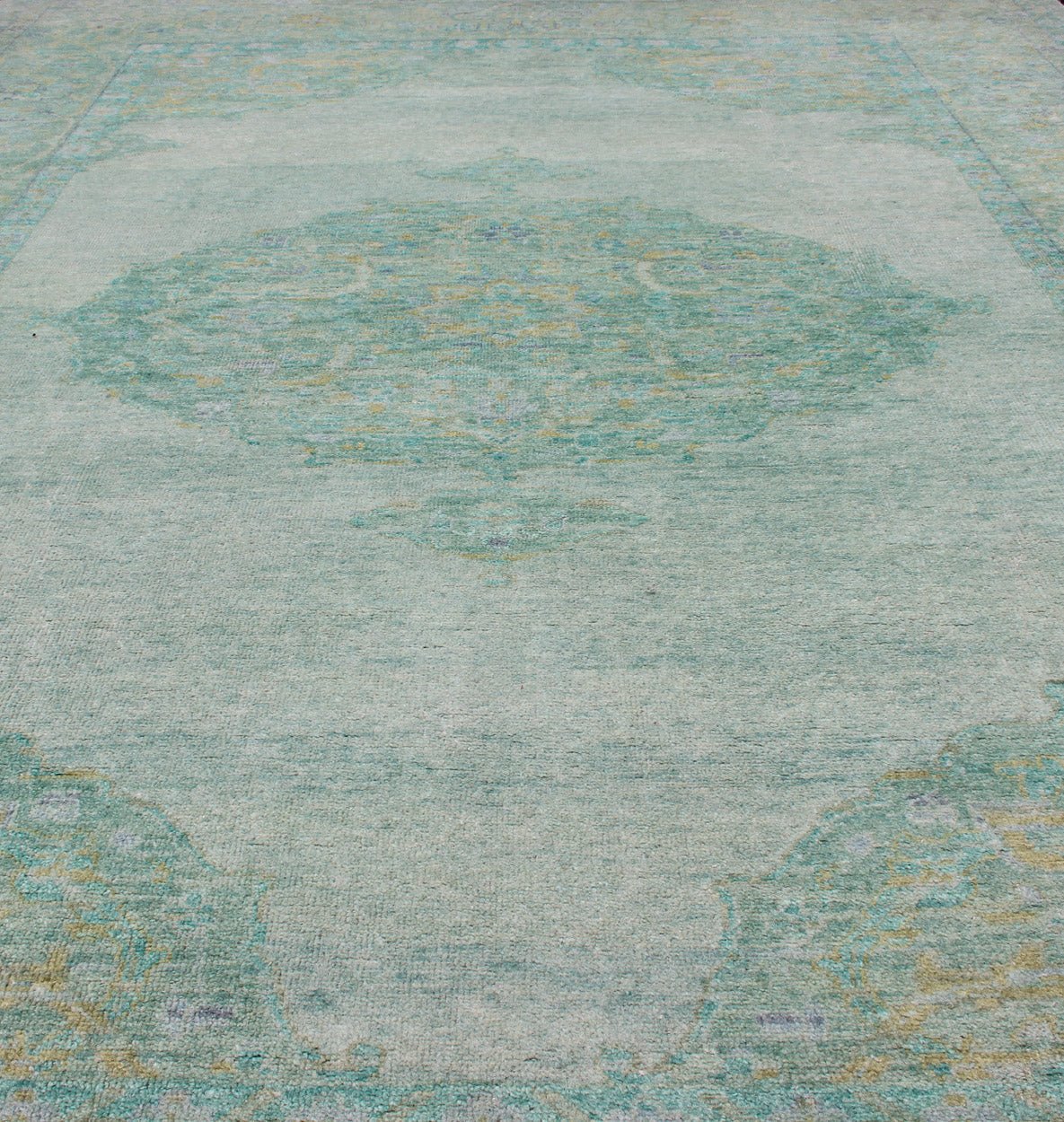 Modern Oushak Rug With Floral Medallion Design in Various Shades of Green. New Oushak Rug, rug/OB - 9242125, country of origin / type: India / Oushak, circa early - 21st Century. Contemporary Indian Rug. This hand - knotted Oushak rug features... - Keivan Woven ArtsOB - 9242125 - 1310012 - 920Rug