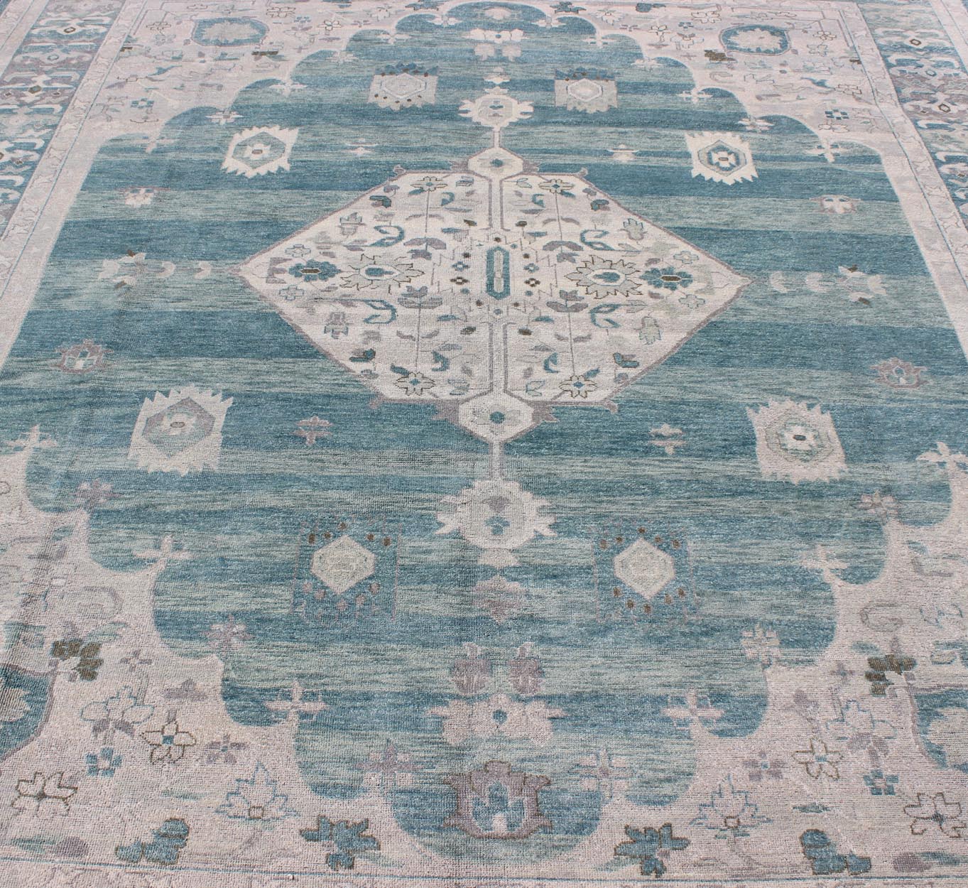 Modern Hand - Knotted Oushak Rug With Central Medallion Design in Gray and Green Tones This modern Indian Oushak rug has been hand - knotted in wool and features a central sub - geometric medallion design rendered in gray/silver and seafoam tones. A c... - Keivan Woven ArtsOB - 9261028 - 0131046 - 4018Rug
