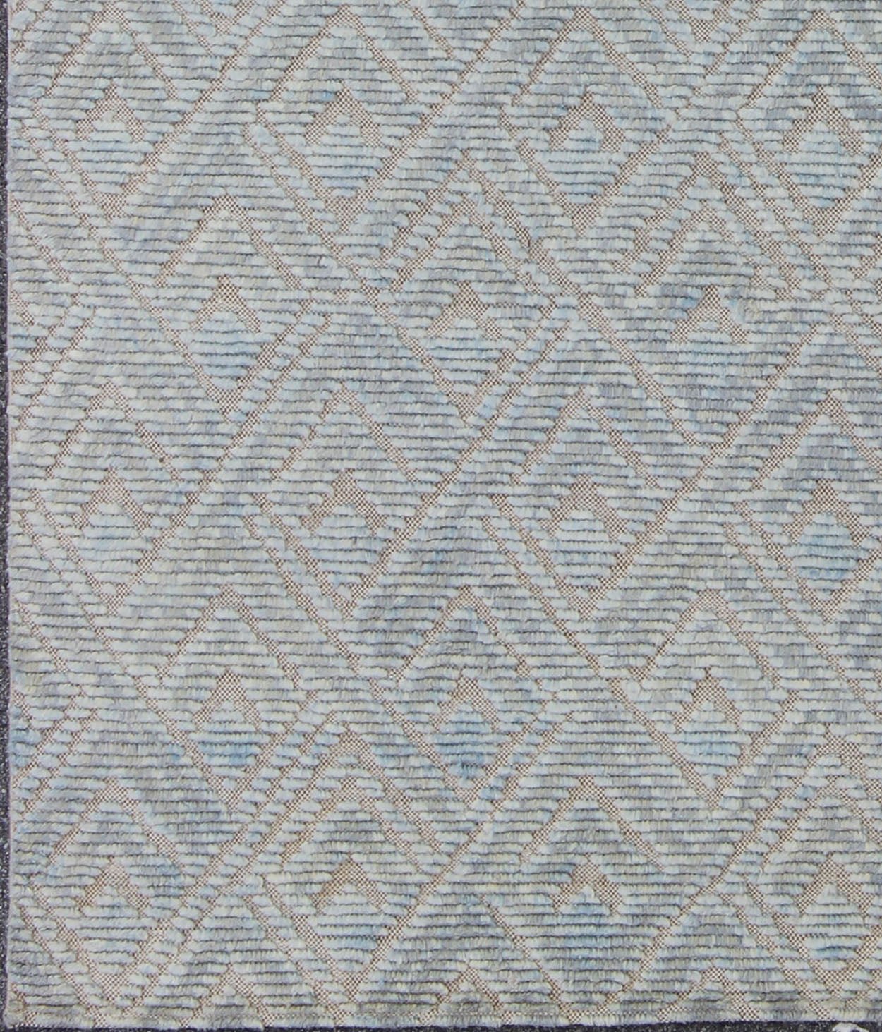 Keivan Woven Arts Hi - Low pile in Moroccan Design with Light Blue. Measures: 8' x 10' This Keivan Woven Arts rug/OB - 9288120 - 521003 is a hand - knotted Hi - Low Moroccan design rug features a modern design rendered in shades of blue. - Keivan Woven ArtsOB - 9288120 - 521003 - 8511Rug