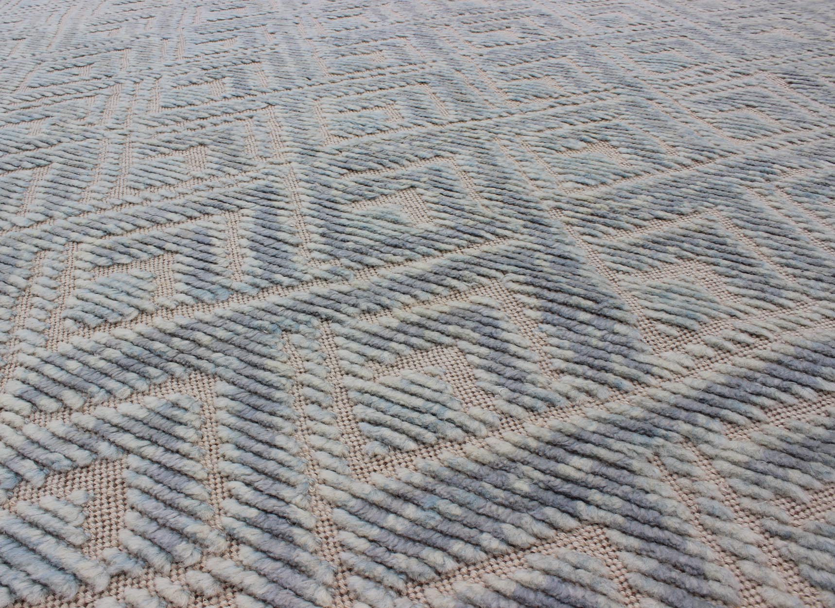 Keivan Woven Arts Hi - Low pile in Moroccan Design with Light Blue. Measures: 8' x 10' This Keivan Woven Arts rug/OB - 9288120 - 521003 is a hand - knotted Hi - Low Moroccan design rug features a modern design rendered in shades of blue. - Keivan Woven ArtsOB - 9288120 - 521003 - 8511Rug