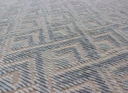 Keivan Woven Arts Hi - Low pile in Moroccan Design with Light Blue. Measures: 8' x 10' This Keivan Woven Arts rug/OB - 9288120 - 521003 is a hand - knotted Hi - Low Moroccan design rug features a modern design rendered in shades of blue. - Keivan Woven ArtsOB - 9288120 - 521003 - 8511Rug