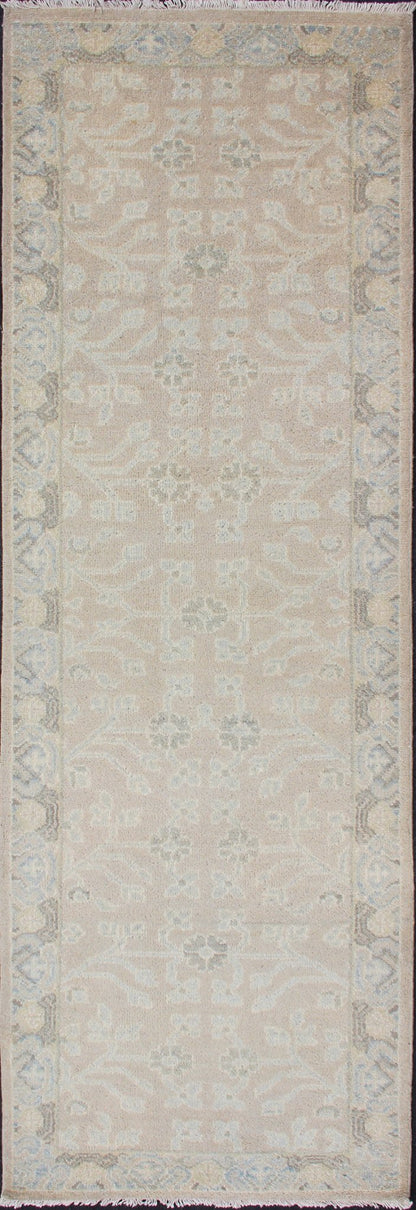 Modern Khotan Runner in Wool with All - Over Sub - Geometric Floral Design This modern Indian Khotan rug has been hand - knotted in wool and features an all - over, sub - geometric floral design rendered in blue and neutral tones. A complementary border e... - Keivan Woven ArtsOB - 9289470 - 6270004 - 11332Rug
