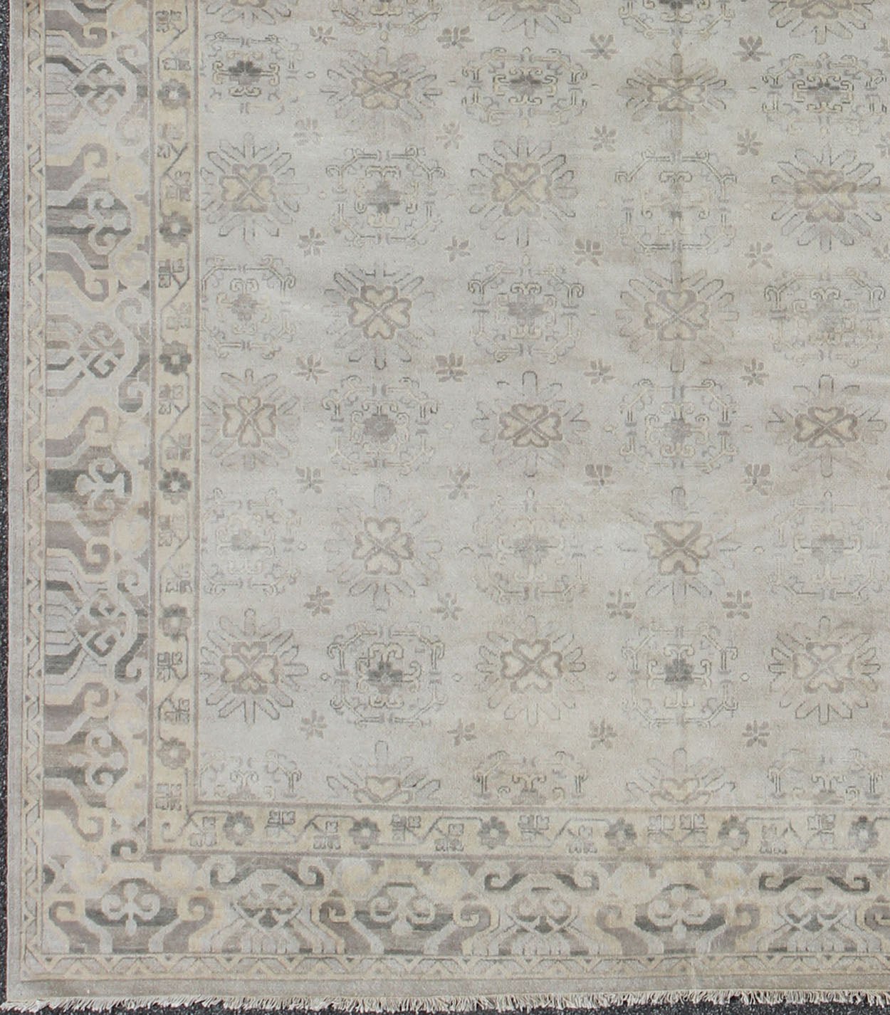 Keivan Woven Arts Hand Knotted Khotan Wool Rug With Sub - Geometric Design. This contemporary Khotan rug has been hand - knotted in wool and features a sub - geometric design rendered in tan and taupe colors. A complementary, multi - tiered border enc... - Keivan Woven ArtsOB - 9299796 - 592009 - 8519Rug