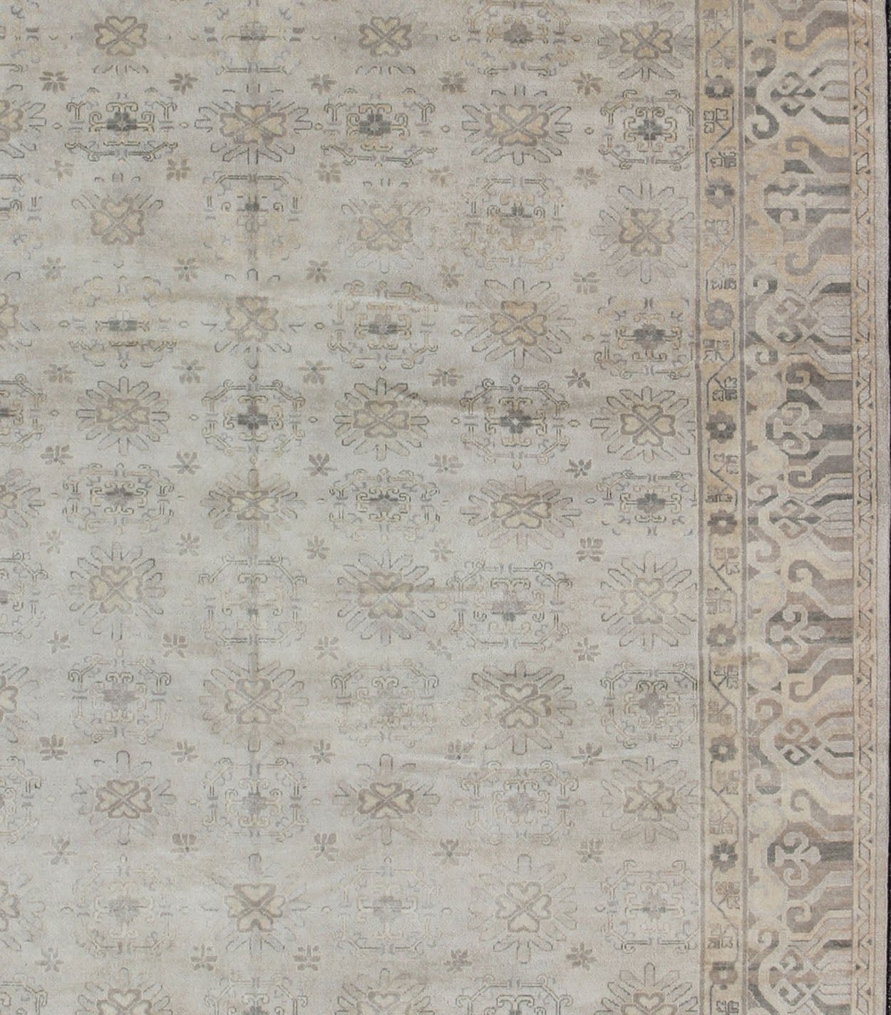 Keivan Woven Arts Hand Knotted Khotan Wool Rug With Sub - Geometric Design. This contemporary Khotan rug has been hand - knotted in wool and features a sub - geometric design rendered in tan and taupe colors. A complementary, multi - tiered border enc... - Keivan Woven ArtsOB - 9299796 - 592009 - 8519Rug