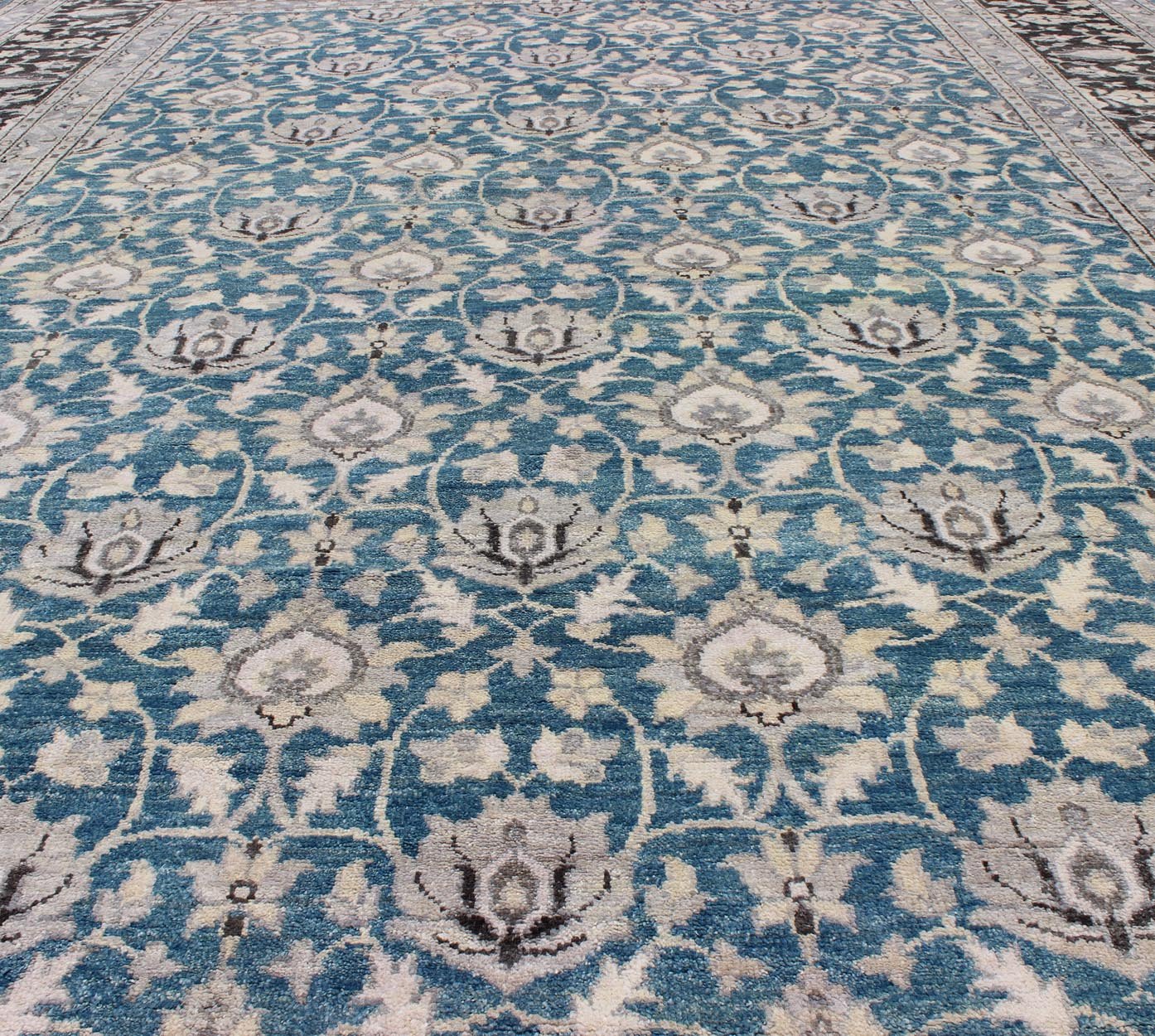 Modern Tabriz Rug in Wool With All - Over Design in Blue, Gray and Charcoal This hand knotted Tabriz rug features a beautiful all - over design rendered in grays, silver, and charcoal and blue tones. The entirety of the piece is enclosed within a c... - Keivan Woven ArtsOB - 9312987 - 6480001 - 9655Rug
