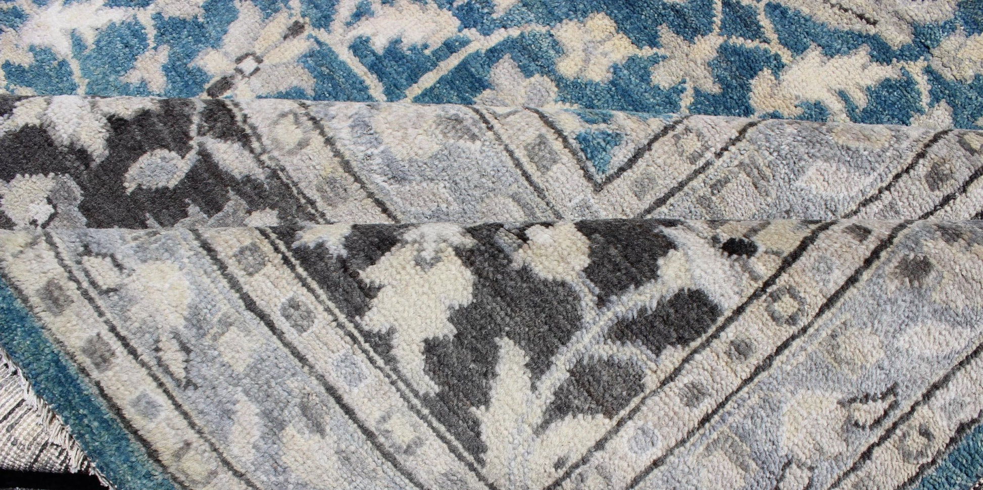 Modern Tabriz Rug in Wool With All - Over Design in Blue, Gray and Charcoal This hand knotted Tabriz rug features a beautiful all - over design rendered in grays, silver, and charcoal and blue tones. The entirety of the piece is enclosed within a c... - Keivan Woven ArtsOB - 9312987 - 6480001 - 9655Rug